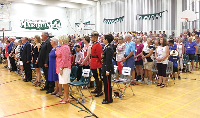 The crowd at the reunion ceremony filled the McNaughton High School gym.